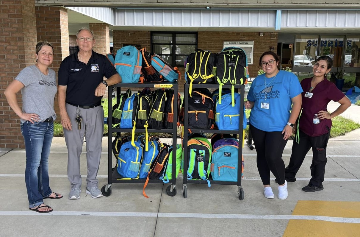 Chapter’s ‘Stuff the Bus’ Program Fills Over 2,000 Backpacks for Local Schoolchildren